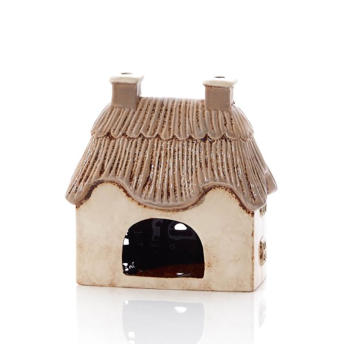 Rear view of cream stoneware thatched cottage tealight holder showing large open arch for tealight, Stoneware Country Cottage Collection