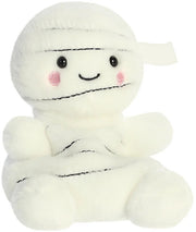 Angled front view of Brendan the Mummy Palm Pal showing the cream bandage wrapping and rosy cheeks