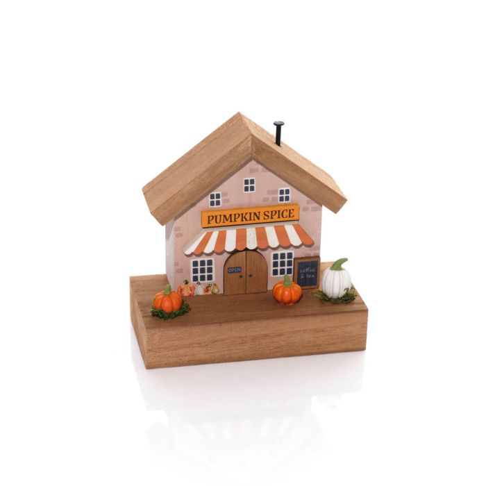 Pumpkin Spice café house wooden ornament with striped awning, painted windows, miniature pumpkins and chalkboard sign on a natural wood base, white background