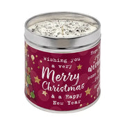 Red festive candle tin with sparkly topping and "Wishing you a very Merry Christmas & a Happy New Year" design