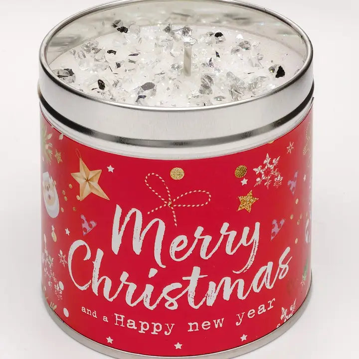 Merry Christmas and Happy New Year candle tin with silver sparkly topping and festive red label with Santa, stars and snowflakes