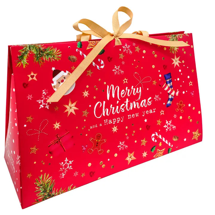 Merry Christmas and a Happy New Year gift bag in bright red with gold foil stars, snowflakes and Christmas icons, gold ribbon handles, comes flat packed