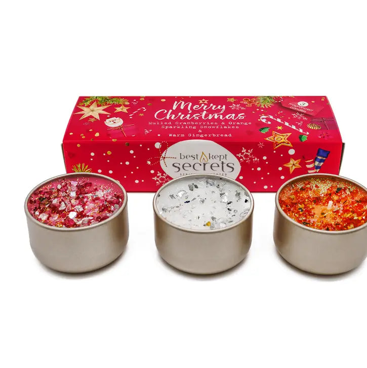 Merry Christmas Three Lites candle gift set with three fragranced tea light cups with sparkly toppings, presented in a festive red Merry Christmas gift box