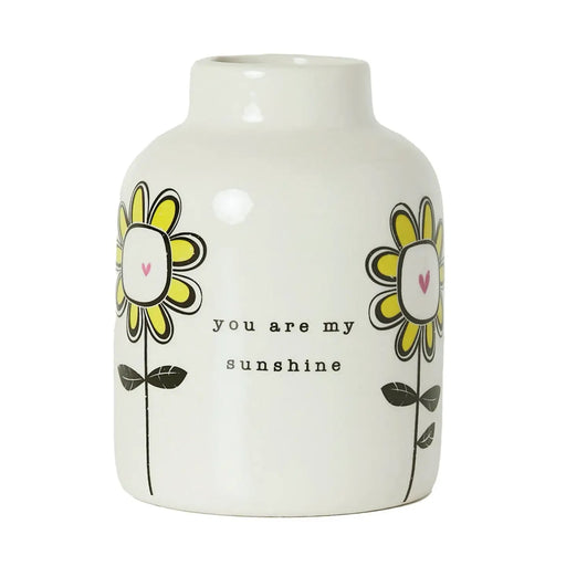 Sunflower ceramic bud vase, front view on white background showing vibrant wrap-around sunflower design