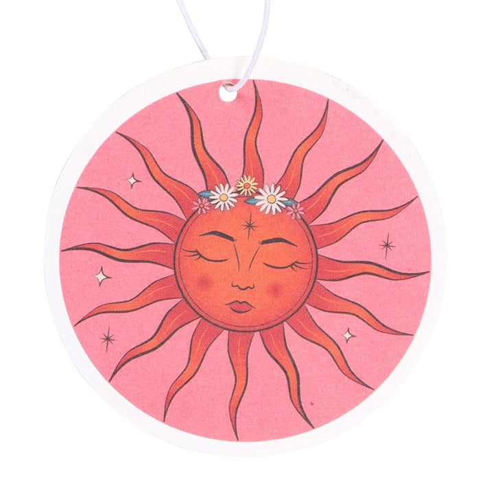 Close-up of the Celestial Dreams The Sun air freshener showing the detailed sun face with daisy flower crown and sparkle details
