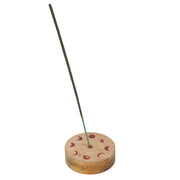 Wooden moon phase incense holder with a single incense stick, white background