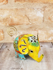 Colourful hand-painted metal elephant ornament small 8cm, handmade in Bali, intricate cut-out pattern detail, gold-coloured wire tail and upturned trunk