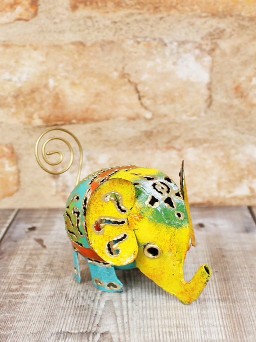 Colourful hand-painted metal elephant ornament small 8cm, handmade in Bali, intricate cut-out pattern detail, gold-coloured wire tail and upturned trunk