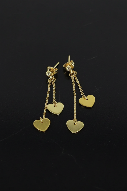 Gold plated double drop heart charm stud earrings with fine chain drops on a black background