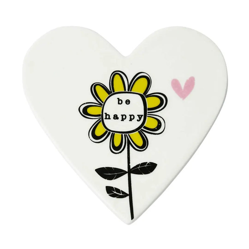 Be Happy woodcut sunflower heart-shaped ceramic coaster, front view on white background