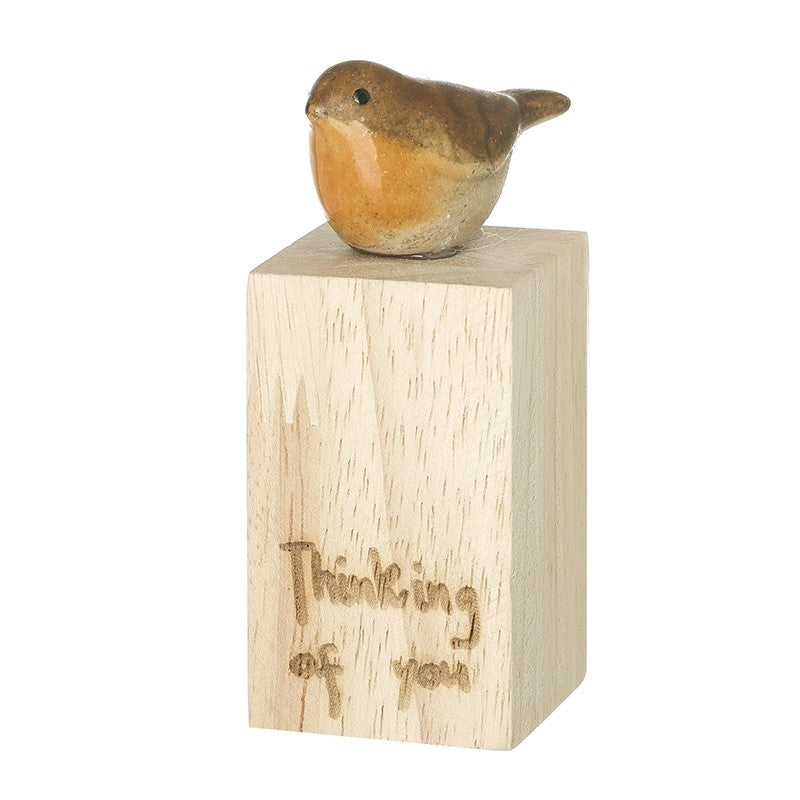 Small robin figurine perched on a natural wooden block engraved with "Thinking of you" in handwritten script, 3.5 x 3.5 x 8.5cm