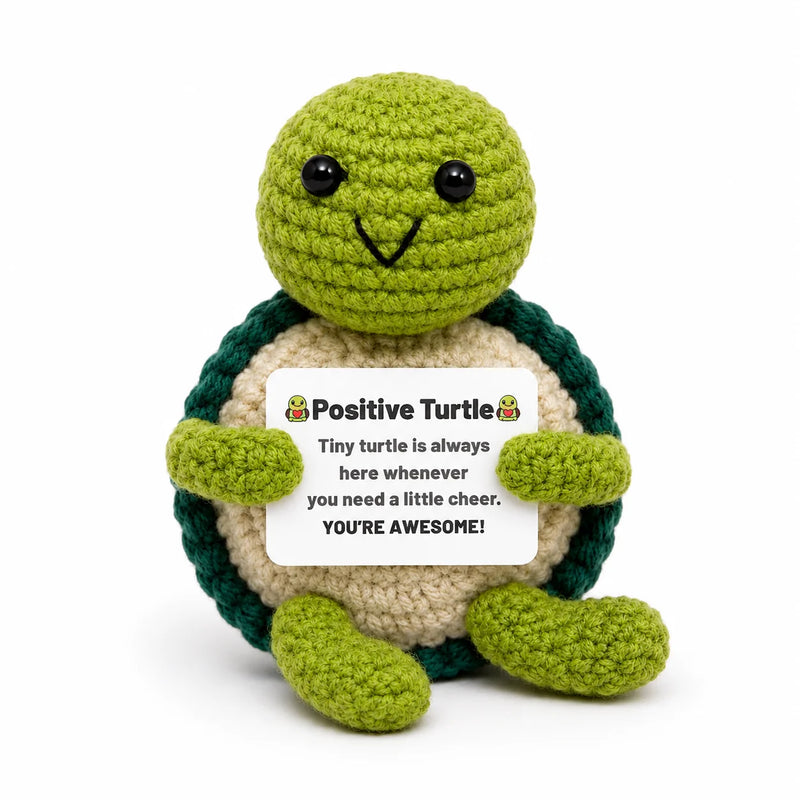Turtle Positive Crochet Gift character with a green shell holding a You're Awesome message card, presented on a white background
