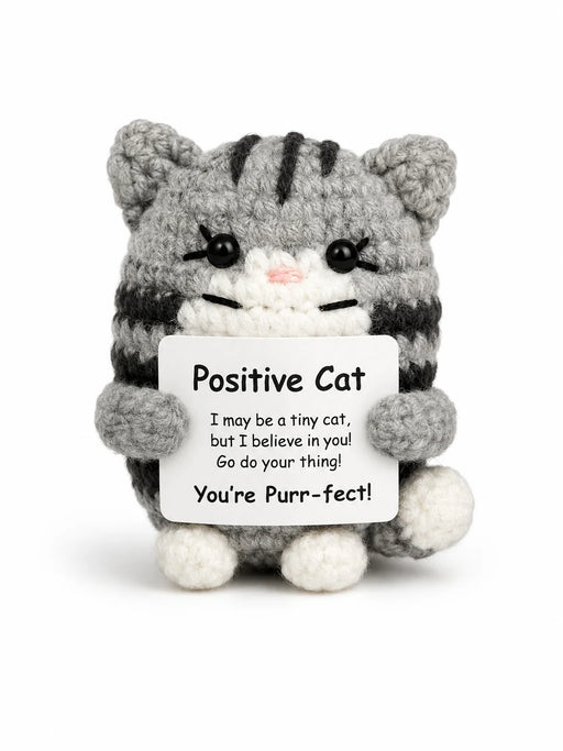 Cat Positive Crochet Gift character as a grey tabby crochet cat with striped detail and white paws holding a You're Purr-fect message, presented on a white background