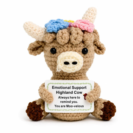Highland Cow Positive Crochet Gift character wearing a floral crown holding a You are Moo-velous message, presented on a white background