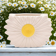 The Cottage Garden daisy ceramic vase by CELEBRATIONS, lifestyle shot — surrounded by fresh daisies