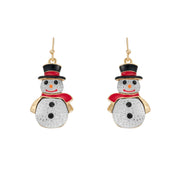 Pair of gold plated crystal snowman drop earrings with black top hat, red scarf and sparkly white body