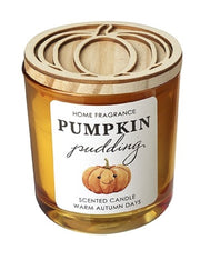 Pumpkin Pudding Scented Candle in amber orange glass jar with laser-cut wooden pumpkin lid on, showing the Pumpkin Pudding Scented Candle Warm Autumn Days label with illustrated pumpkin