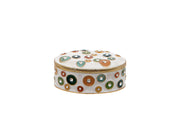 Millefiori Trinket Box white metal oval trinket box covered with raised circle and freeform details in muted tones each with a crystal-effect centre stone with gold-tone rim on white background