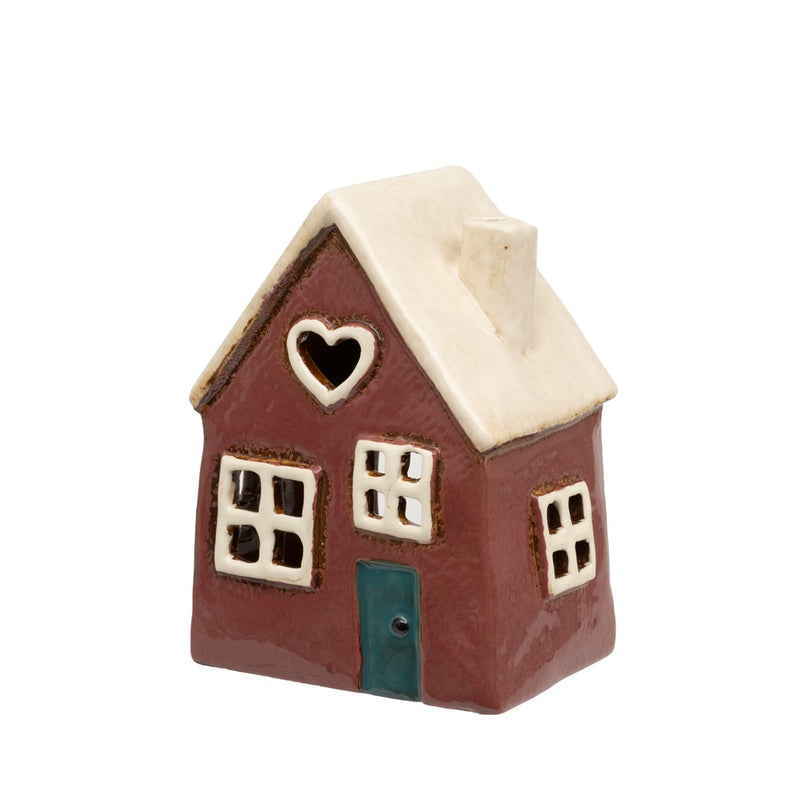 Primrose Cottage Tealight Holder ceramic tealight cottage with cream roof heart-shaped cut-out window in the gable white-framed windows teal front door and chimney on white background