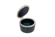Botanical Ceramic Trinket Box open showing deep teal ceramic body with silver-tone filigree border and hinged domed lid on white background