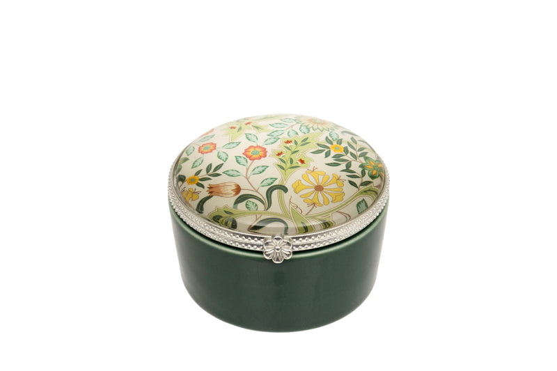 Verde Botanical Trinket Box deep forest green ceramic round hinged trinket box with botanical print lid featuring trailing foliage and open blooms on a cream background with silver-tone beaded rim and flower-detail clasp on white background