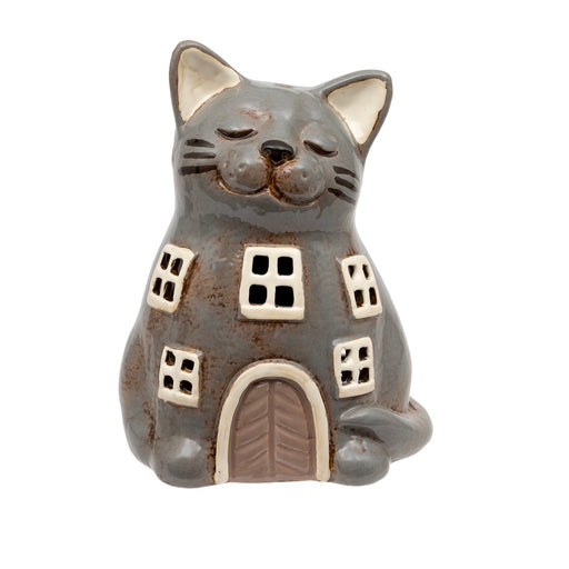 Ceramic cat house tealight holder with smiling cat face, arched door and cut-out windows