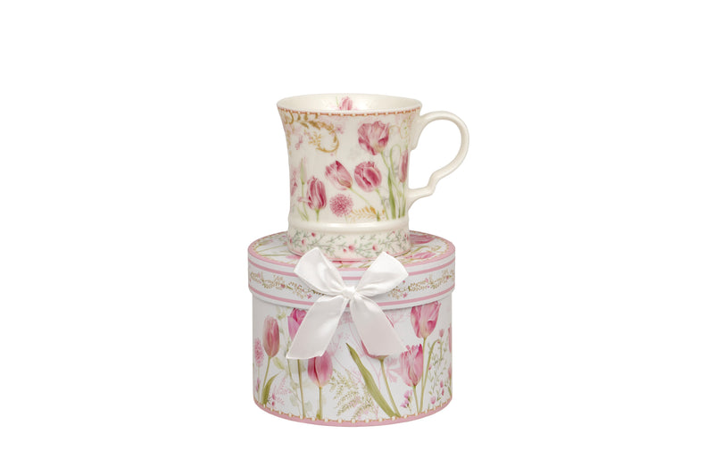 Marlow Tulip Mug in Gift Box tulip print mug sitting on top of a matching circular gift box tied with a white ribbon bow on white background