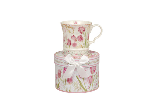 Marlow Tulip Mug in Gift Box tulip print mug sitting on top of a matching circular gift box tied with a white ribbon bow on white background