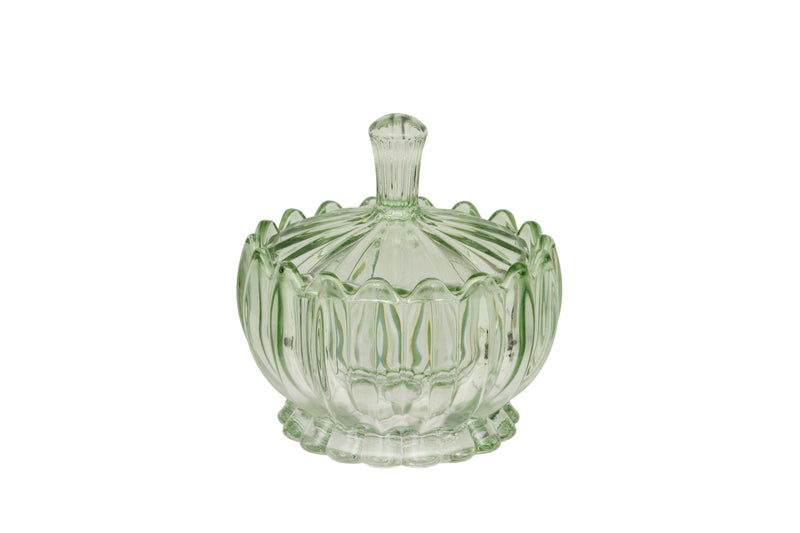 Scalloped Glass Lidded Jar pale green glass lidded jar with rounded squat shape ribbed and scalloped pattern scalloped rim and tall cylindrical finial on white background