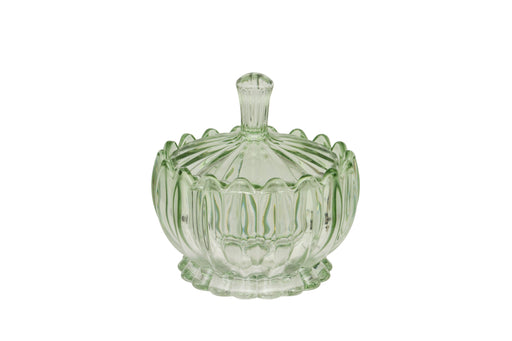 Scalloped Glass Lidded Jar pale green glass lidded jar with rounded squat shape ribbed and scalloped pattern scalloped rim and tall cylindrical finial on white background