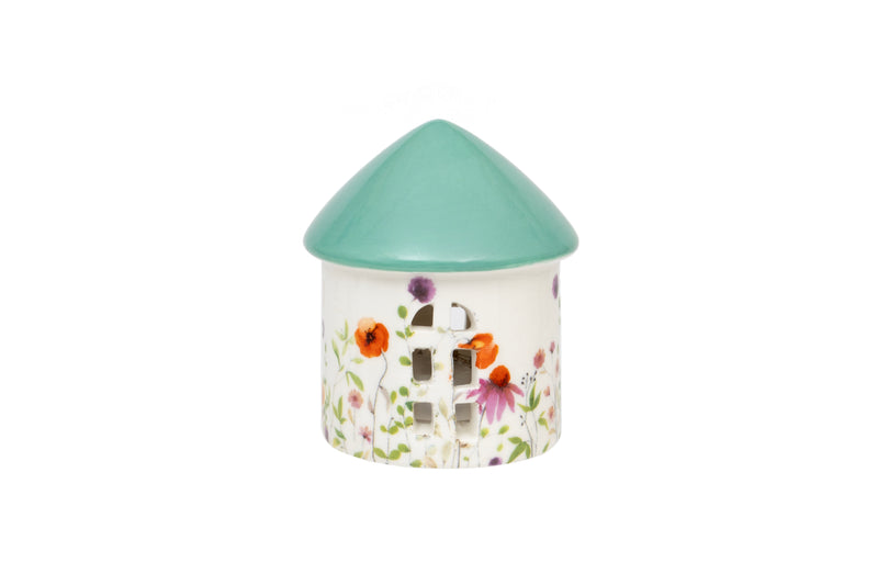 Meadow Flowers Ceramic LED House with blue-green conical roof and meadow flowers print on the front with cut-out windows on white background