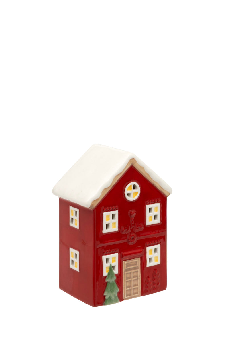 Conifer LED Cottage ceramic two-storey LED house in bold red with snow-capped white roof round glowing gable window glowing windows small Christmas tree by the door and wooden-style front door on white background