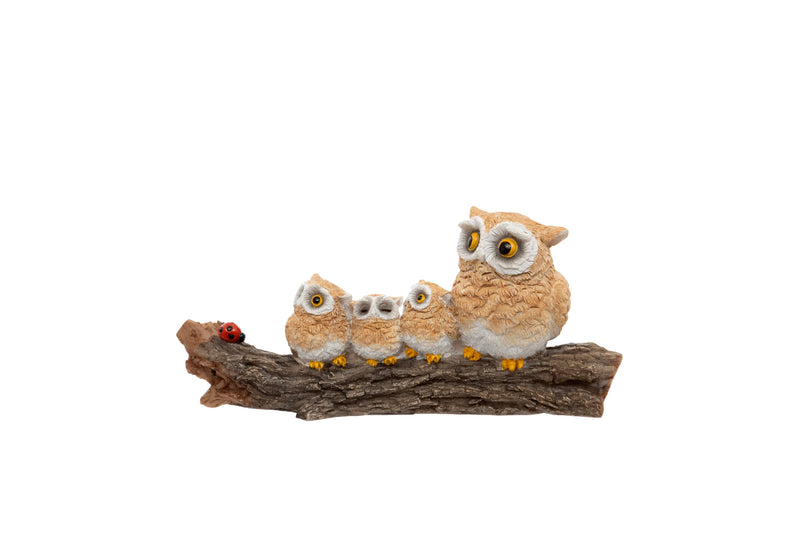 Owl Family on Log Figurine polyresin figurine of parent owl and three owlets perched on a textured log with a ladybird detail on white background