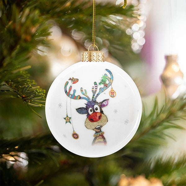Rudolph reindeer Christmas tree bauble in the Bug Art style hanging on a Christmas tree with soft festive bokeh background
