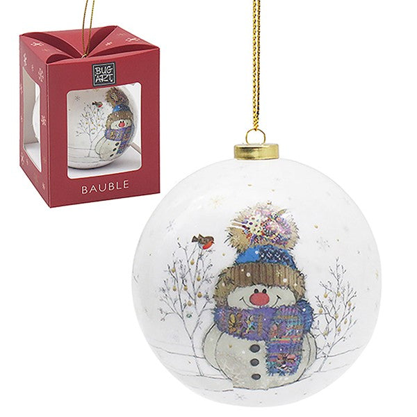 Snowman Christmas tree bauble featuring a cheerful snowman in a fluffy bobble hat and striped scarf with a robin on a branch in a snowy scene, Bug Art design, gold hanging loop, arrives in a gift box