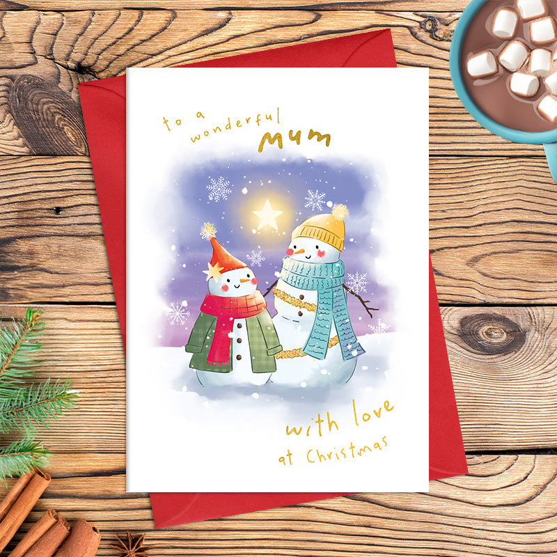Wonderful Mum Christmas card featuring two illustrated snowmen wearing cosy scarves and hats beneath a glowing star, surrounded by snowflakes, with the message ‘With love at Christmas
