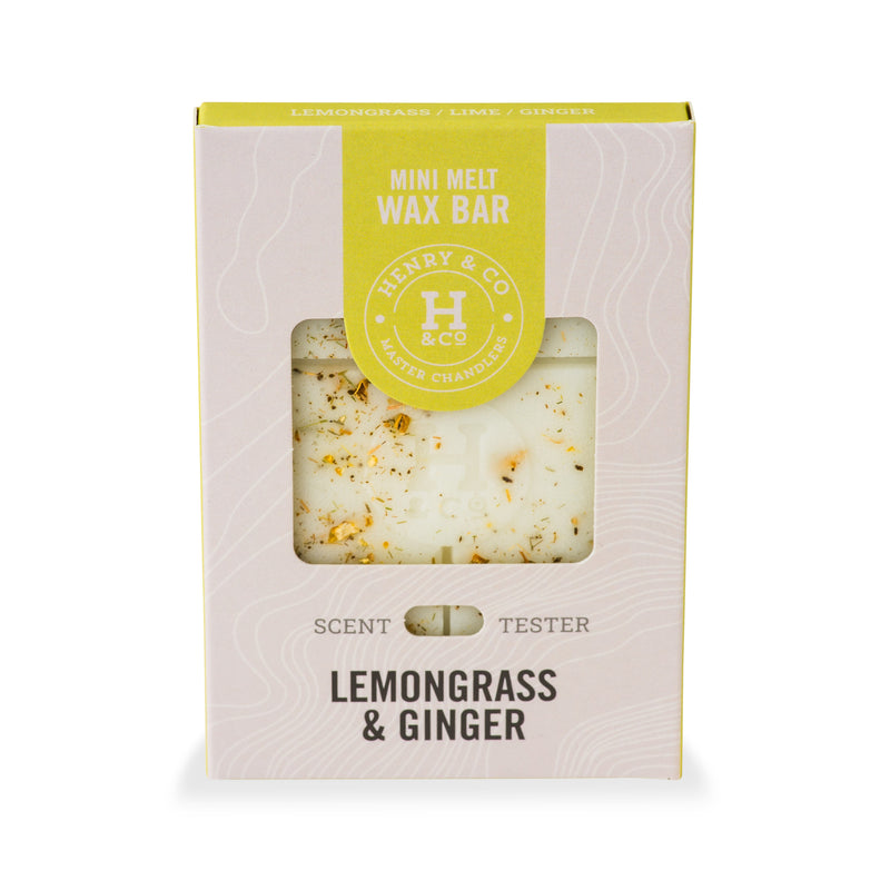 Henry & Co Mini Melt Wax Bar in Lemongrass and Ginger fragrance, shown in cream and yellow-green packaging with dried botanicals visible through the window
