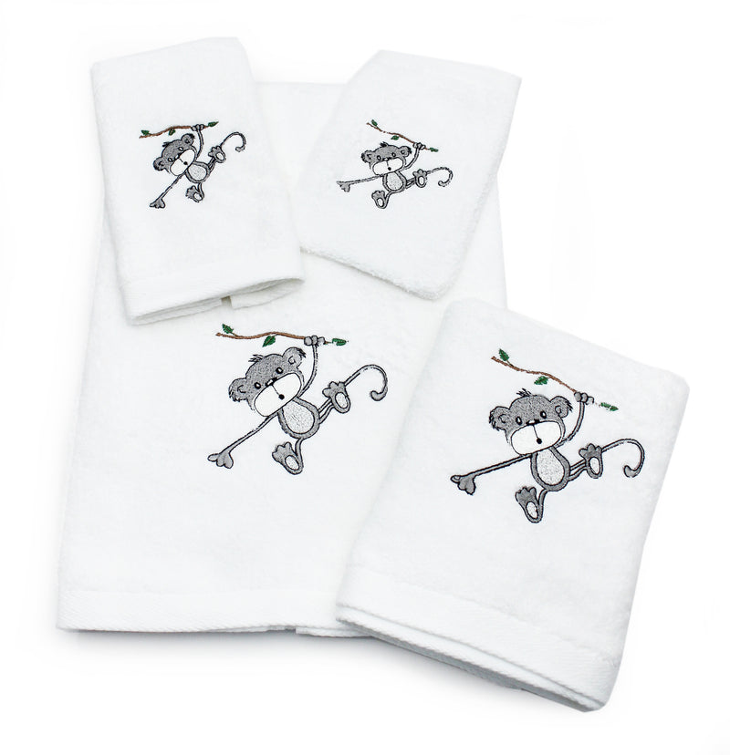 Set of white cotton baby towels with embroidered grey monkey swinging on a vine with green leaves, on white background
