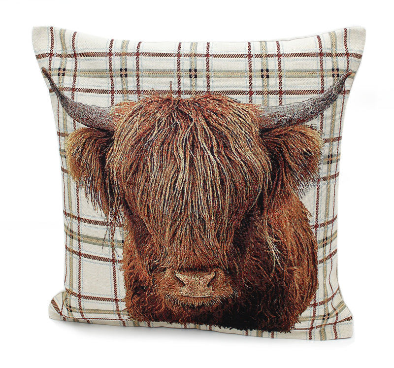 McGregor Highland cow cushion with printed shaggy cow design and curved horns on cream tartan background