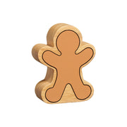 Back of wooden gingerbread man toy showing plain design, outlined shape and natural wood grain edge