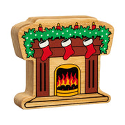 Wooden fireplace toy with three hanging stockings, festive garland, painted candles and flame detail