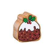 Wooden Christmas pudding toy with sauce topping, holly leaves, berries and a natural wood grain edge