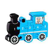 Five-piece wooden train counting jigsaw numbered 1–5, with a smiling driver and wheel details.