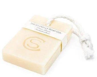Clovelly Soap Co. Ocean Breeze handmade bar soap on an unbleached cotton rope, cream-coloured cold-process bar with embossed logo, handcrafted in Devon