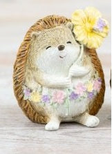 Adorable resin hedgehog ornament with flower garland, 7cm