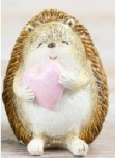 Adorable resin hedgehog ornament holding a pink heart, 7cm