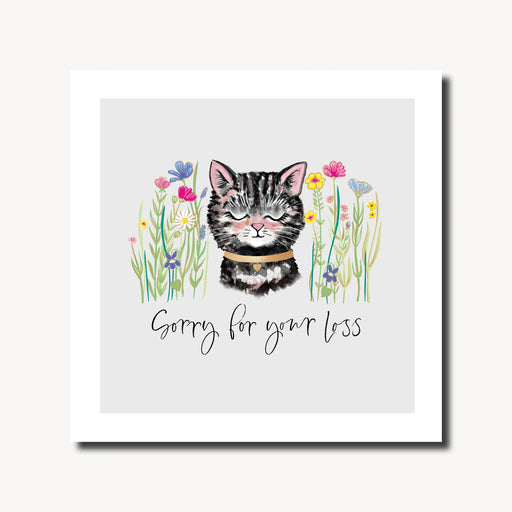 Pet sympathy card with a hand-drawn cat with eyes gently closed wearing a gold heart collar, surrounded by wildflowers, rainbow foil finish, square format 6.1 x 6.1 inches