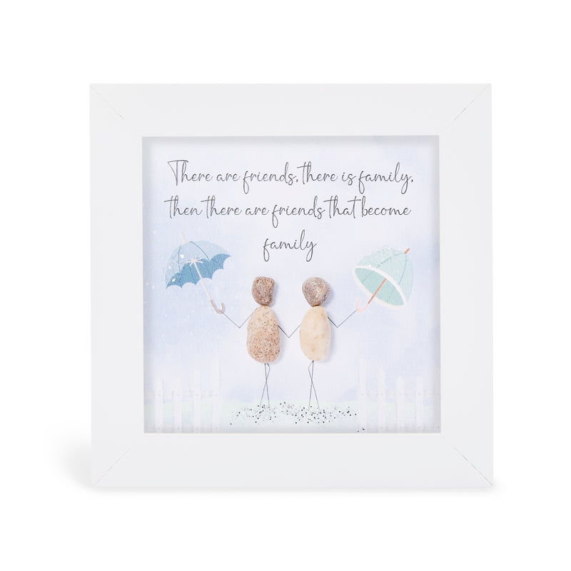 "There are friends, there is family, then there are friends that become family" glitter mini plaque, white frame with two pebble figures holding hands, each raising a pastel umbrella above a sparkling glitter ground

