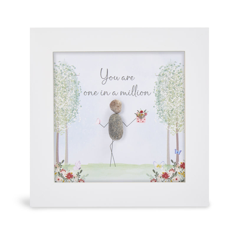"You are one in a million" glitter mini plaque, white frame with a pebble figure holding a bouquet and butterfly, sparkling trees and colourful wildflower border with butterflies