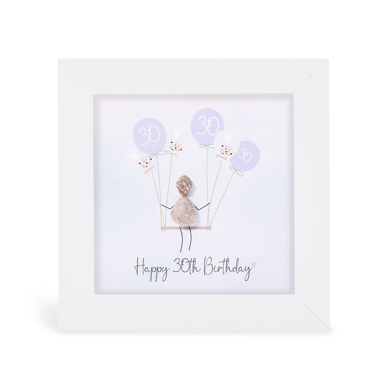 "Happy 30th Birthday" mini plaque, white frame with a pebble figure sitting on a swing holding a bunch of soft lilac balloons